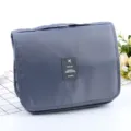 Trousse de toilette de voyage imperméable à suspendre avec grande capacité et rangement. - Gris