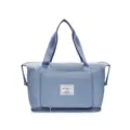 Blue foldable travel duffel bag with wet and dry separation for gym and short trips. - Sapphire Blue