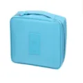 Trousse de toilette de voyage portable bleu clair, pochette organisatrice compacte. - Bleu ciel