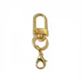 Détail de porte-clés mousqueton boucle en U en métal doré, accessoire pour sacs et loisirs. - 50x12mm / Or