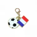 Close-up detail of the metal soccer ball and French flag enamel charm with a gold lobster clasp. - France Flag / 37x17mm 2.7g