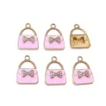 Cute pink alloy handbag pendant charm with sparkling rhinestones, ideal for DIY jewelry making. - Pink
