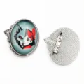 Oval alloy brooch featuring split wolf and girl art glass cabochon with secure pin back. - B3-46 / 30x40mm Inner Diameter