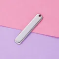 Close-up detail of polished stainless steel rectangular pendant, perfect for DIY jewelry making. - Steel