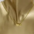 Gold stainless steel heart and letter M pendant necklace for women and couple fashion jewelry. - Heart Letter N / Gold
