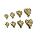 Close-up detail of 3D puffy heart gold metal pendants charms for jewelry making DIY accessories. - 12x8mm / Gold