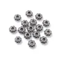 Detailed close-up view of metallic pumpkin flower spacer beads, perfect for DIY jewelry crafting. - 6.5x3.5mm / Steel