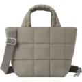 Detailed view of the stylish quilted crossbody bag, featuring soft padded texture and strap. - Khaki