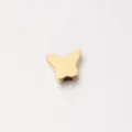 Gold stainless steel butterfly bead for DIY jewelry making, detailed shot of charm design. - Gold