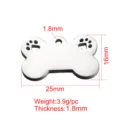 Detalle de placa para mascotas de hueso de acero inoxidable con medidas 25x16mm y huella. - 25x16mm Pata de Perro Hueca / Color acero