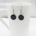 Elegant black mermaid scale earrings featuring round resin pendants and durable silver hooks. - Black