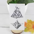 Waterproof temporary tattoo sticker featuring retro black and white mountain designs for body art. - RC-538