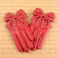 Red PU leather gloves with big bow and metal studs detail view, fashion performance accessory. - One Size / Big Bow With Studs / Red