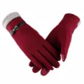 Detailed view of women winter warm touch screen gloves in wine red with cute bow decor. - Red