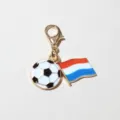Detailed view of metal enamel soccer ball and flag charm pendant with lobster clasp for DIY. - Flag Pendant Style (SG-D5-34-AB1-02)
