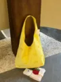 Yellow embroidered tote bag with bow details, large capacity casual shoulder bag detail view. - Yellow