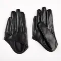 Black PU leather gloves detail shot, sleek full finger design for edgy street style or party. - Black