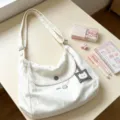 Casual white canvas shoulder bag with cute cat embroidery, large capacity daily tote handbag. - Black and White Button Crossbody Bag