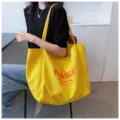 Yellow canvas tote bag for women, large capacity casual single shoulder bag for daily commuting. - Yellow