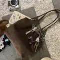 Brown suede shoulder tote bag detail view, featuring cute dachshund charm and checkered lining. - Without Pendant / Horn Buckle Suede Tote Bag / Dark Coffee