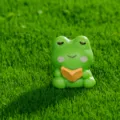 Mini statuetta rana verde che legge libro resina ornamento micro paesaggio giardino 1.8cm - Rana che legge