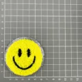 Yellow fuzzy smiley face embroidered patch with silver glitter border style variant. - Silver Bottom Smiley Face (1C6-6) / Yellow