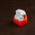 Mini white animal figurine on red sofa, cute resin desktop ornament, 3.5cm size. - Sofa Puppy