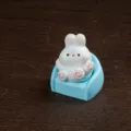 Cute white rabbit on blue sofa miniature figurine, mini resin desktop ornament for decor. - Sofa Rabbit