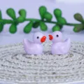 Mini statuetta di anatra in resina micro paesaggio vaso succulente giardino ornamento. - Viola