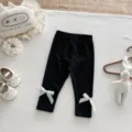 Infant baby girl black leggings with cute white bow details, high elastic slim pants. - 66cm / Bottoms / Black