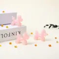 Natural rose quartz balloon dog figurine, pink crystal carved puppy crystal decor for cute desktop display. - Rose Quartz Balloon Dog