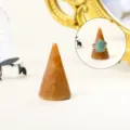 Natural crystal cone ring holder for desktop jewelry display, elegant gemstone storage stand. - Orange Aventurine