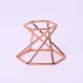 Rose gold geometric metal crystal ball stand, perfect for home decor sphere display. - Rose Gold