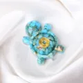 Turquoise resin turtle figurine with gold foil flakes, feng shui lucky crystal desktop decor variant. - Turquoise