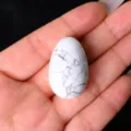 Natural crystal stone small egg ornament, polished jade bird egg for home decor and Easter gifts. - Howlite