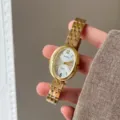 Gold oval quartz watch with elegant metal chain strap, vintage fashion wristwatch for women. - Gold Band White Face