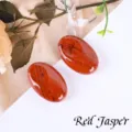 Pierre de paume polie en jaspe rouge naturel pour le massage, la méditation et la déco. - Jaspe Rouge