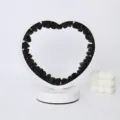 Decorazione da tavolo in pietra grezza di ossidiana nera a forma di cuore con base bianca - Meteorite Nero