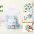 Natural green aventurine rough crystal stones in white organza gift bag for home decor. - Green Aventurine Raw Stone Gift Bag