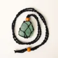 Handmade natural green stone crystal necklace with adjustable black braided rope net pocket. - Green Fluorite - Black Mesh Pocket