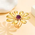 Bague fleur dorée réglable avec pierre violette au centre, bague ouverte élégante. - Bague (J03339) / Améthyste (J03339)