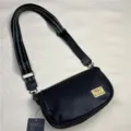 Stylish black leather crossbody bag for men with patterned wide strap and brand logo patch. - Black (34)