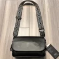 Men casual crossbody bag stylish black shoulder bag with wide woven strap and brand tag - Black