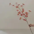 Detailed view of artificial autumn red leaf branch, perfect for home decor and floral arrangement. - Large Size / Autumn Red
