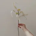 Artificial eucalyptus branch with leaves and small fruits for home decor and wedding arrangement. - Beige
