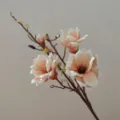 Detailed close-up of artificial magnolia flower branch, realistic EVA texture, elegant home decor. - Champagne