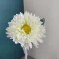 Artificial silk flower detail shot, white petals with yellow center, beautiful decor. - White