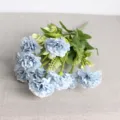 Detail view of blue artificial carnations, displaying realistic soft flower petals and stem texture. - Blue