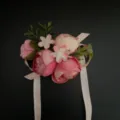 Artificial pink rose wrist flower corsage with green leaves and ribbon for wedding party decor detail. - Wrist Corsage / Deep Pink