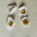Detailed view of white artificial poppy flower heads, perfect for DIY hair accessories and crafts. - Small Flower Head / 1 Piece/Pack / White